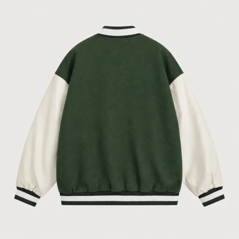 Back view of structured green varsity jacket showing shoulder fit