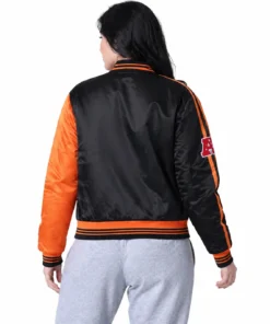 Material: Satin Fabric Inner: Viscose Lining Front: Snap-Tab Button Closure Sleeves: Long Sleeves Collar: Ribbed Style Cuffs: Ribbed Style Color: Orange Pockets: Two Outside and One Inside