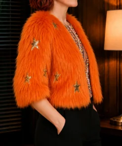 S03 Elsbeth Carrie Preston Orange Faux Fur Jacket